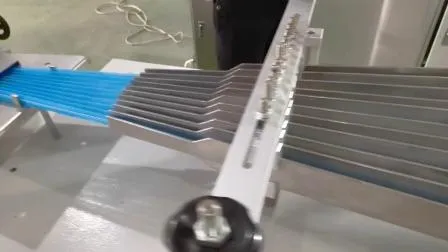 Máquina para fabricar tampas de orelha descartáveis ​​de plástico ultrassônico enrolador de bobina